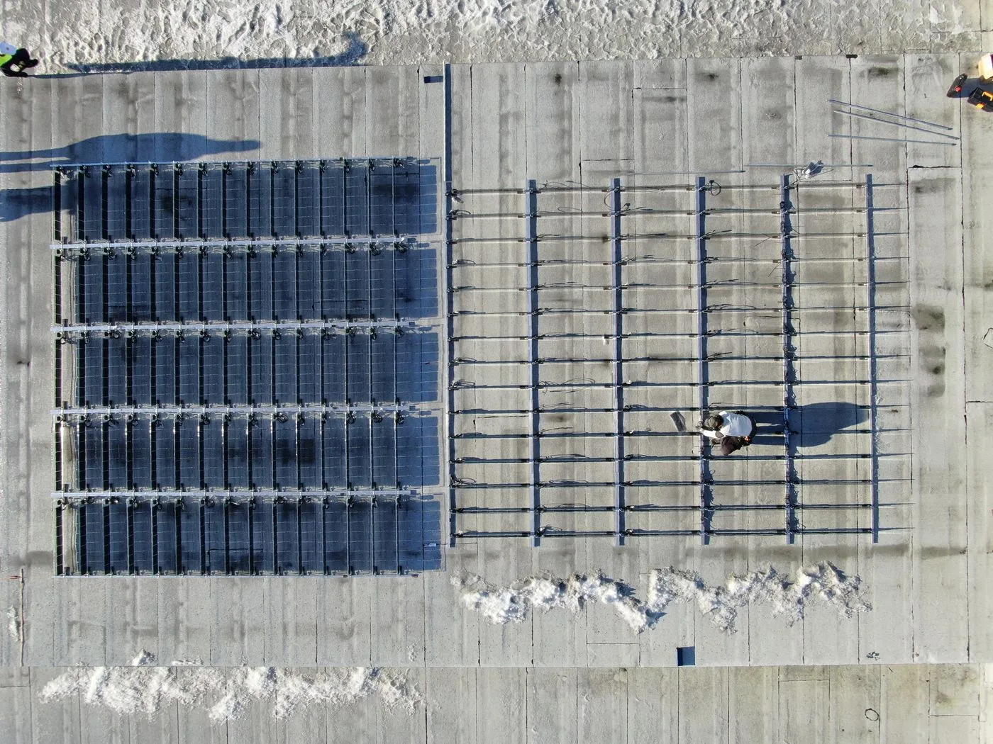 Rooftop array of vertical bifacial solar panels seen from above